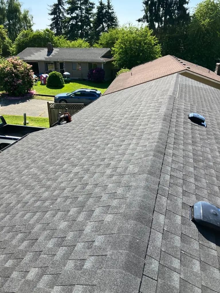 Asphalt shingle roof replacement on single-family home in Bellevue, Washington