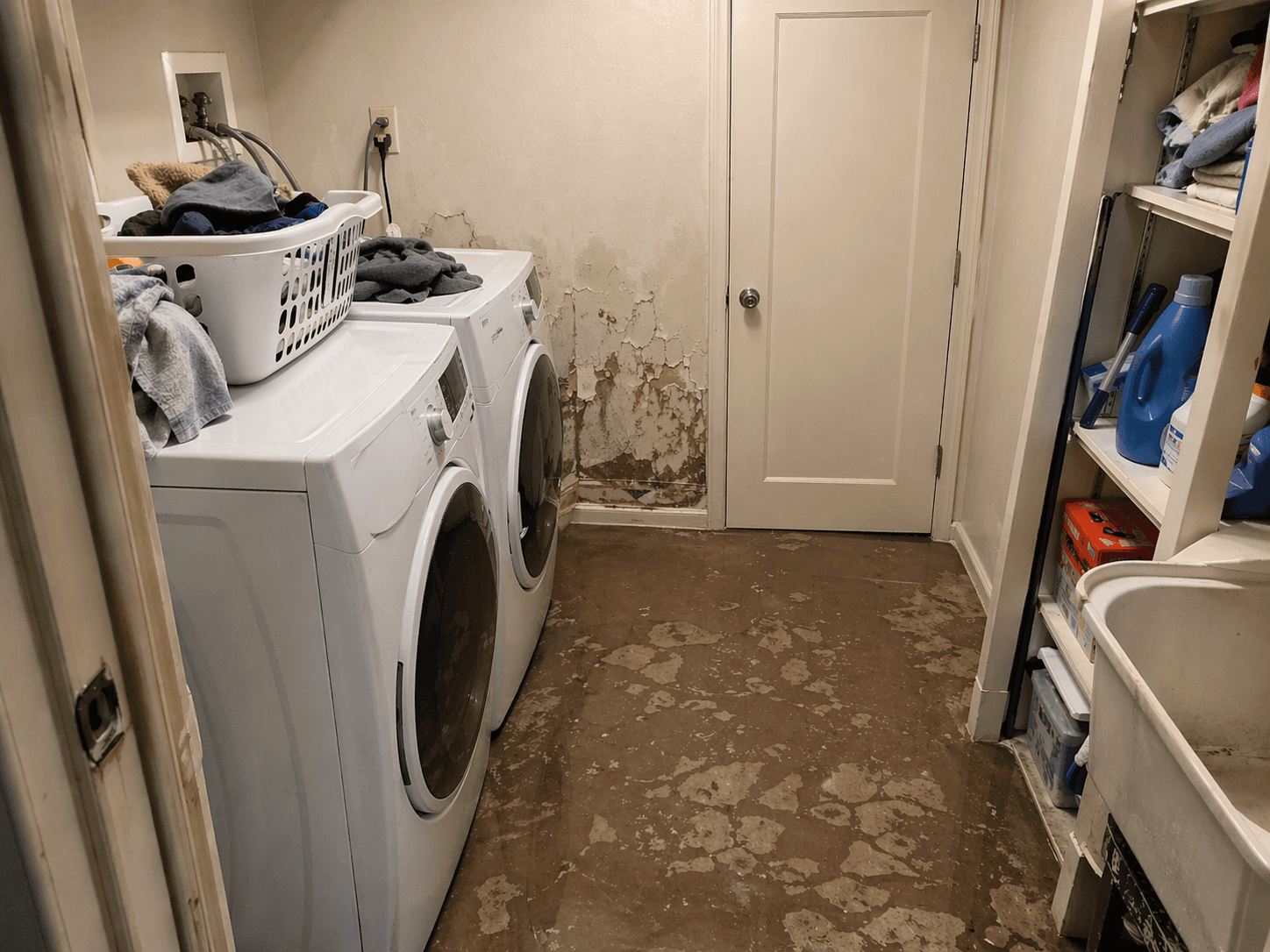 Seattle Water Damage Restoration in Laundry Room Seattle water damage restoration in a laundry room by Fine Element Construction remodeler